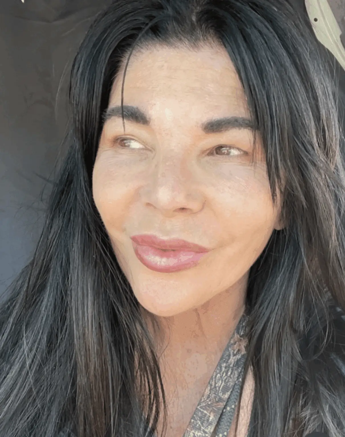 Close up of a woman with long dark hair