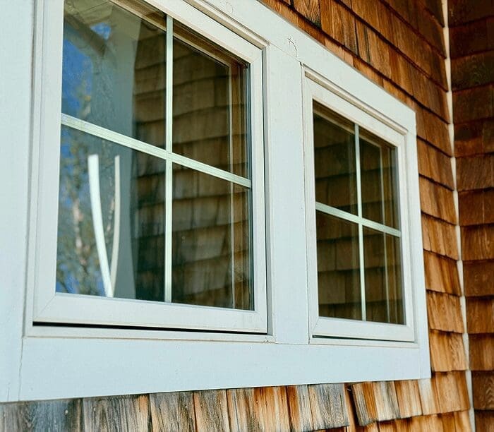 Wooden house with windows.